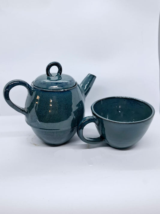 Teapot with cup